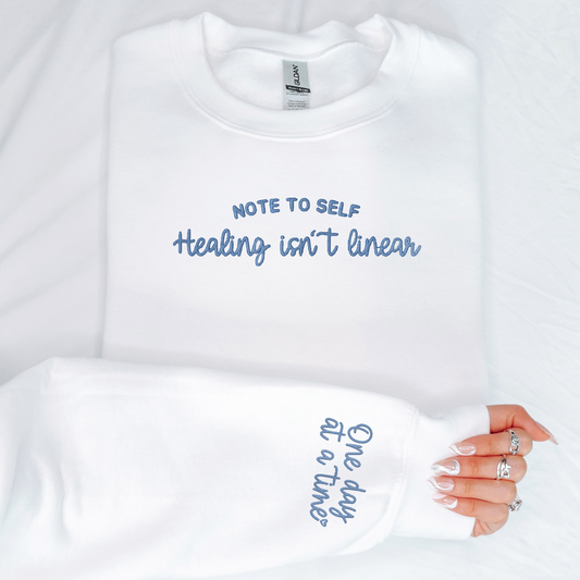 Healing isn’t Linear Embroidered Sweatshirt